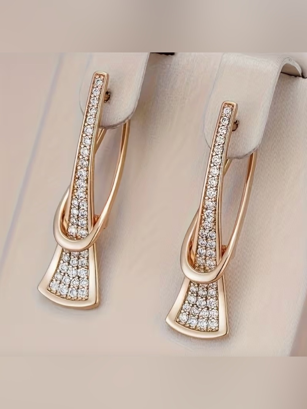 Rose Gold Pavé Drop Hoop Earrings with Clear Crystals.